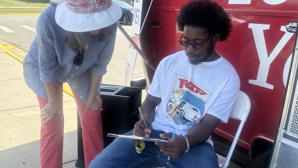 A League of Women's Voter volunteer helps a CSU sophomore register to vote in the Nov. 2025 General Election. The group is visiting more than 25 Ohio colleges to register students and all eligible adults.