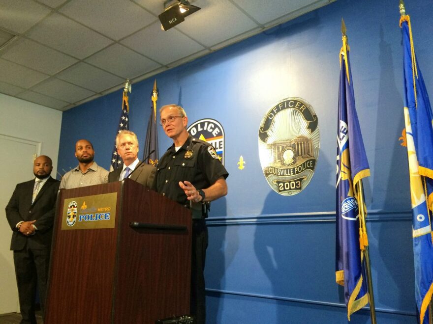 Former Louisville Metro Police Chief Steve Conrad with Mayor Greg Fischer at a news conference in September 2016.