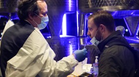 A medical professional administers a COVID-19 test to enter City Winery Tuesday, Nov. 24, 2020, in New York. City Winery will be the first restaurant in the nation to create a "100% COVID-tested space". The program will run every Tuesday and Wednesday evening for the remainder of 2020. (Frank Franklin II/AP)