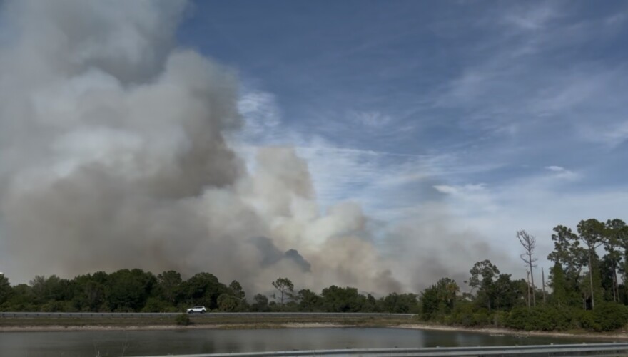 Smoke and flames could be seen near I-75 in Charlotte County Saturday afternoon.