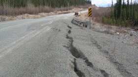 Permafrost thaw often creates cracks along the shoulders of the Alaska Highway, like these on a stretch of the road in the Yukon.
