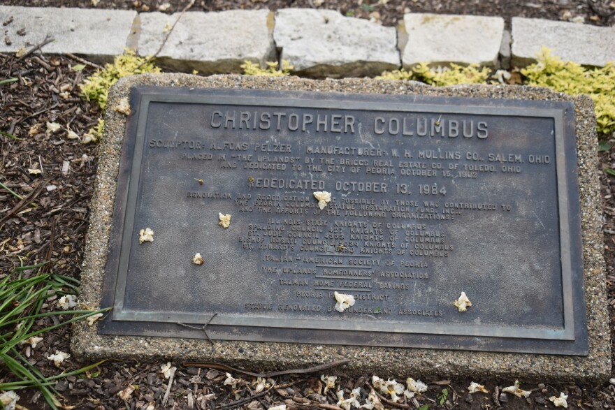 The plaque for the Christopher Columbus statue in Laura Bradley Park.