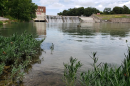 Below the old spill gate of the dam on Lake McQueeney