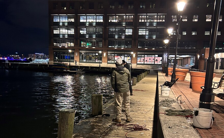 Magnet fishers set up on a pier in the Fells Point neighborhood of Baltimore on January 26.