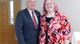 Fort Wayne Mayor Tom Henry and Easterseals Arc participant Shelby pose for a photo together after the news conference announcing new workforce development initiatives.