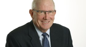 Bob Davis was the voice of KU sports for 32 years and would go on to call games for the Kansas City Royals for 16 years.