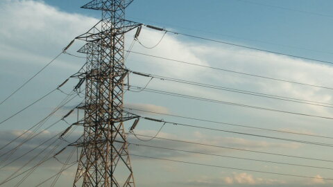 Transmission lines carry high-voltage electricity across large geographic areas from power plants to local substations that can then distribute it to homes and businesses.
