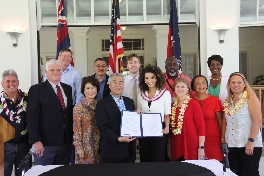 Gov. David Ige signs a bill on June 16, 2021, recognizing June 19 as Juneteenth.