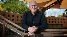 Jeff Roberts leans on a railing at the Springs Preserve.