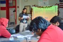 Greg Brenner, the American government teacher at Guadalupe Centers High School, reviews the presidential race with students a week ahead of the November election.