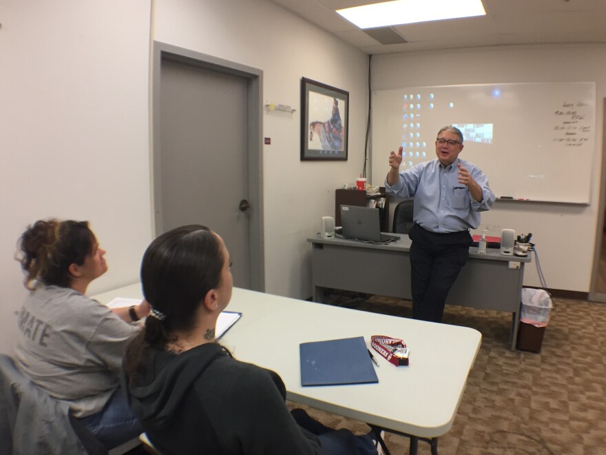 Andy Hall welcomes Oklahoma inmates to workplace transition classes at The Education and Employment Ministry in Oklahoma City.
