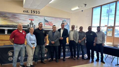 U.S. Senator Martin Heinrich (D-NM) poses for a portrait with labor union leaders.