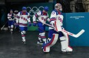 United States' goalkeeper Connor Hellebuyck and his teammates arrive for a preliminary round match of men's ice hockey between Latvia and the United States at the 2026 Winter Olympics, in Milan, Italy, Thursday, Feb. 12, 2026.