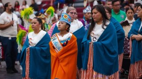 Star Yellowfish, director of Native American student services for Oklahoma City Public Schools (left), attends a powwow with students in 2025.