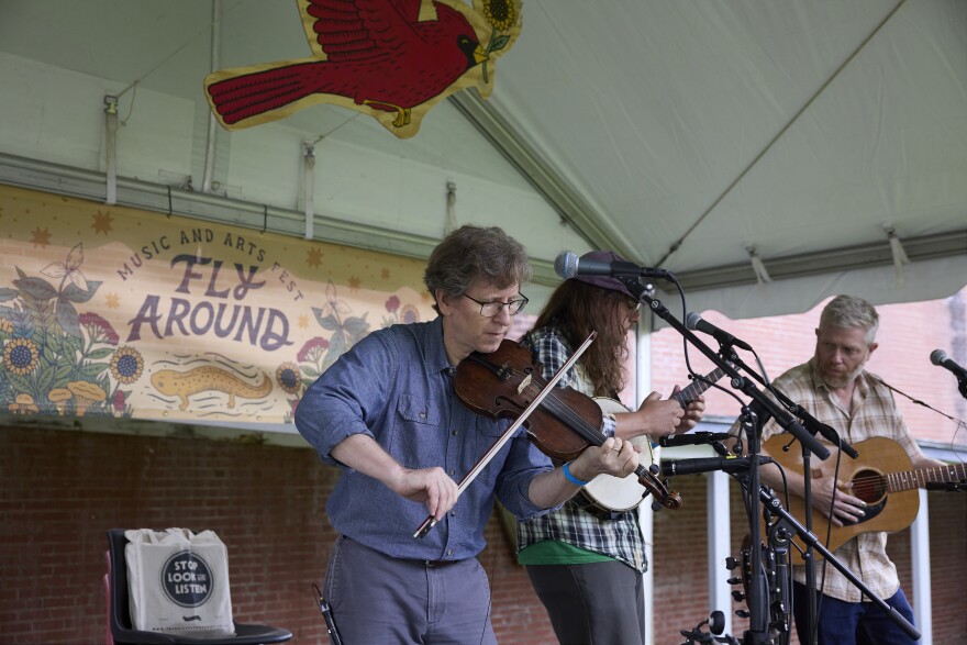 fiddlers under a tent
