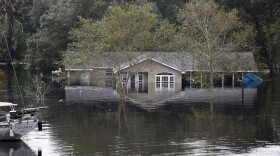 FILE -  Flood waters rising in Conway, S.C., impacting surrounding cities and neighborhoods to include Myrtle Beach, S.C., Sept. 25, 2018.