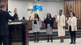Indianapolis Mayor Joe Hogsett swears in the newest members of the Indianapolis Public Schools Board of Commissioners during the board's meeting, Tuesday, Jan. 7, 2025: Ashley Thomas, District 1; Deandra Thompson, at large; Allissa Impink, District 4; and Gayle Cosby, District 2.