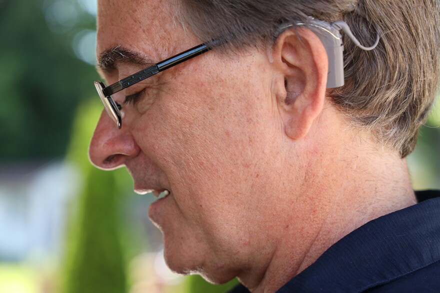 Woody Livingston is seen in profile at his Henrietta home.