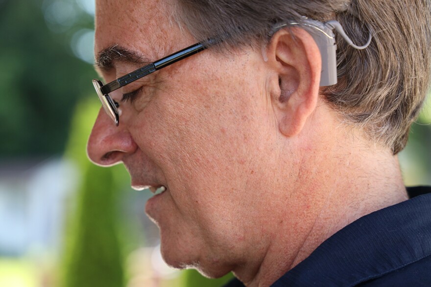 Woody Livingston is seen in profile at his Henrietta home. 