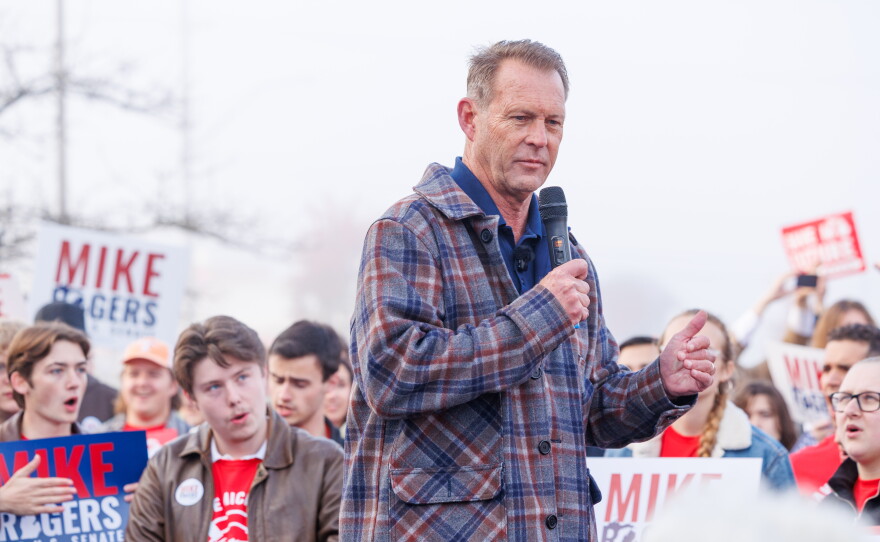 Republican nominee for attorney general Doug Lloyd speaks in Lansing Township, Mich., on Oct. 24, 2026, during a stop on U.S. Senate nominee Mike Rogers' "We Have a State to Save" bus tour.