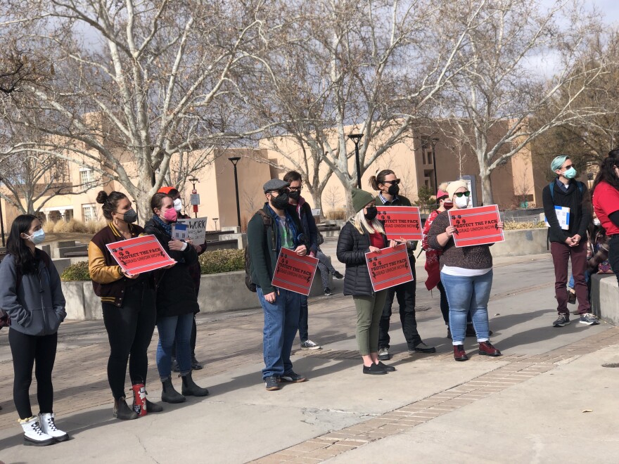 Graduate workers and their supporters rally on the UNM campus