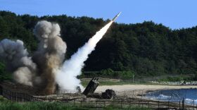 In this handout photo released by the South Korean Defense Ministry,  U.S. M270 Multiple Launch Rocket System firing an MGM-140 Army Tactical Missile during a U.S. and South Korea joint missile drill aimed to counter North Korea's intercontinental ballistic missile test on July 5, 2017 in East Coast, South Korea. The U.S. Army and South Korean military responded to North Korea's missile launch with a combined ballistic missile exercise on Wednesday, into South Korean waters along the country's eastern coastline. (South Korean Defense Ministry via Getty Images)