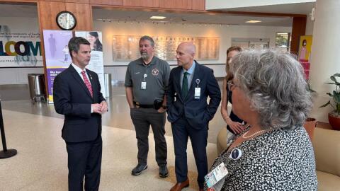 Congressman John McGuire campaigned at UVA's medical center but did not answer questions about a vote that cost constituents healthcare coverage.