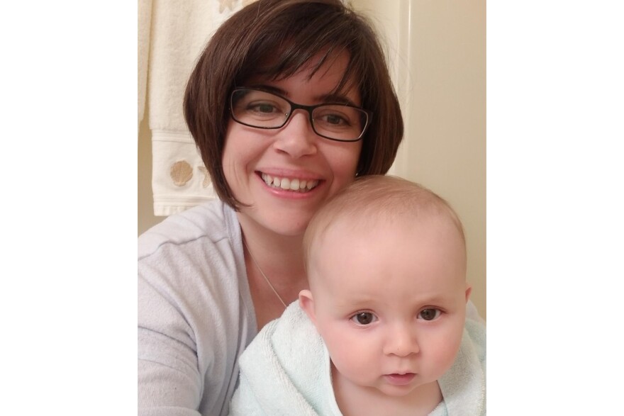 Erin Passetti takes a picture with her son.