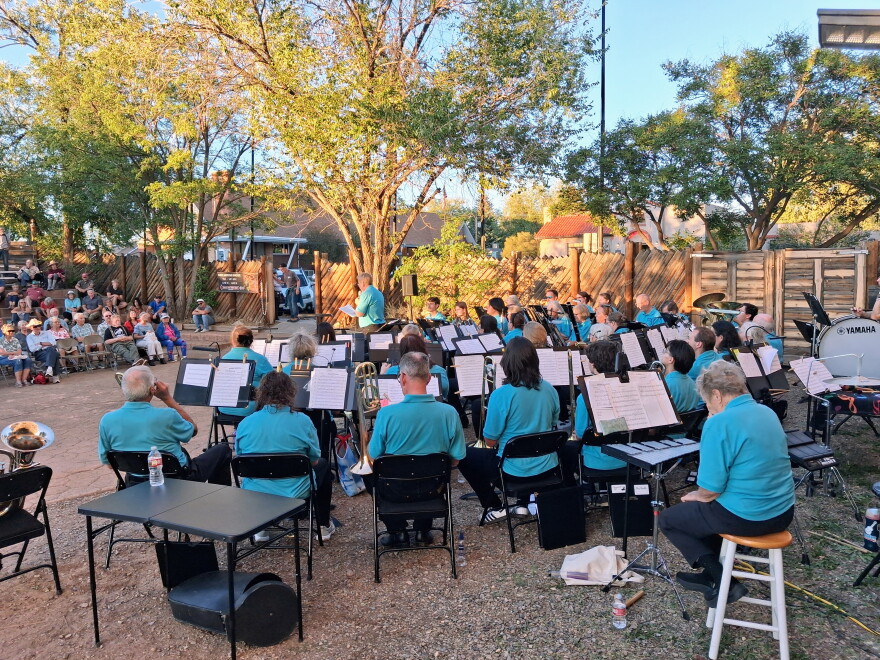 Karen Steele introduces the Four Corners Community Band during the world premiere of Jadon Cruzan's Cortez Overture on Aug. 15 at the Cortez Cultural Center. The piece was written in celebration of Cortez’s 140th anniversary. Photo by LP McKay/KSJD