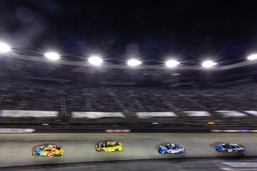 Ty Gibbs (54) leads Carson Hocevar (77), Kyle Larson (5), and Ryan Blaney (12) during a NASCAR Cup Series auto race Saturday, Sept. 19, 2026, in Bristol, Tenn.