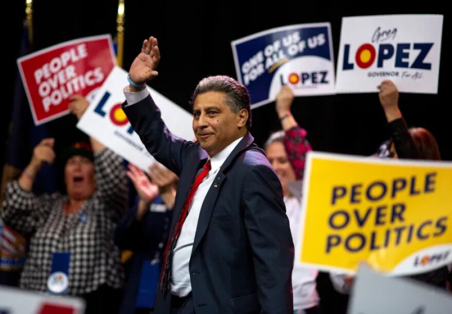 Republican candidate for governor Greg Lopez waves during the GOP assembly at the Broadmoor World Arena on Saturday, April 9, 2022, in Colorado Springs.
