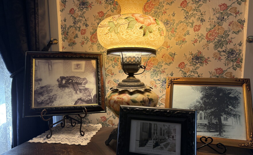 Though the original furniture and decor inside the home were lost to time, these are real photos from or around the day of the crime in 1892, including an actual photograph of Andrew Borden's dead body. Credit: Sofia Barr/Ocean State Media