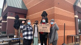 From left to right, Jen Lenz, Violet Vaden, Jon Gill and Sarah Rodden, stand outside the Campustown Starbucks at 1200 W. Main St. in Peoria.