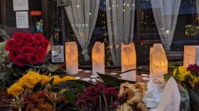 Flowers and candles at a vigil