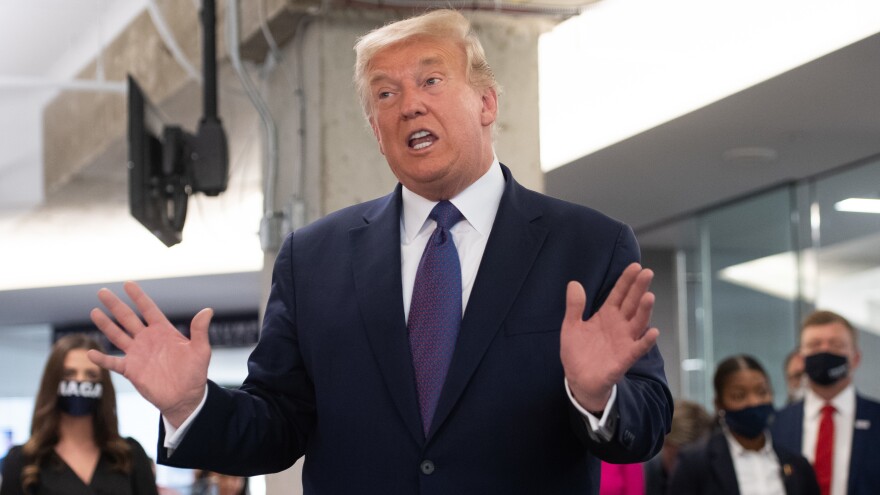 President Trump visits his campaign headquarters in Arlington, Va., on Tuesday as Americans went to the polls to decide whether to give him a second term.