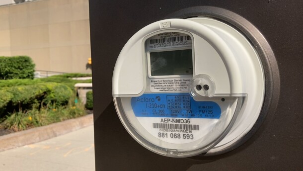 A meter measures power consumption.