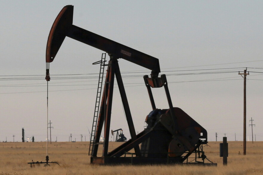 FILE - A pumpjack is seen, Wednesday, March 30, 2022, in Tatum, N.M. New Mexico’s State Land Office will withhold lease sales indefinitely on its most promising tracts for oil and gas development in the Permian Basin as it seeks approval for the state Legislature to increase top-tier royalty rates. Land Commissioner Stephanie Garcia Richard confirmed the decision Thursday, March 7, 2024. (AP Photo/Cedar Attanasio, File)