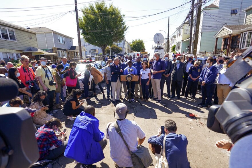 New York Sen. Chuck Schumer, D.-NY, center left, Gov. Kathy Hochul, second from right center, and Mayor Bill de Blasio, right, take part in a news conference near a home in Queens on Thursday, Sept. 2, 2021.