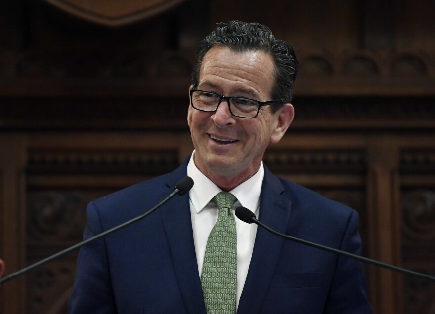 Connecticut Gov. Dannel Malloy addresses the House and the Senate as the legislative session ends at the State Capitol in May in Hartford, Conn. 