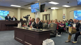 Left to right at the table-CPE President Aaron Thompson-Senate President Pro Tem David Givens 02-15-24