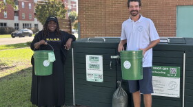 Jay Boone, executive director of KUSP, and Cameron Kania, CEO of Tidewater Compost, stand at a composting dropoff station at the Berkley Community Center in Norfolk on Sept. 9, 2026.