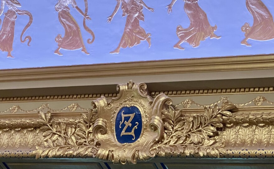 A "Z" medallion over the Zeiterion stage is centered beneath a frieze of Greek muses that dance around the perimeter of the auditorium. The historic Zeiterion theater in New Bedford is reopening after a two-year, $37 million renovation. Images from Jan. 6, 2026 — 11 days before the opening show.
