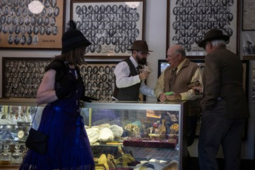 Actors take part in a reenactment of an infamous bank robbery during a tour.