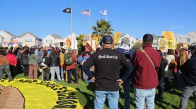 People gather in Veterans Memorial Park in Richmond during the teachers strike in December 2025.