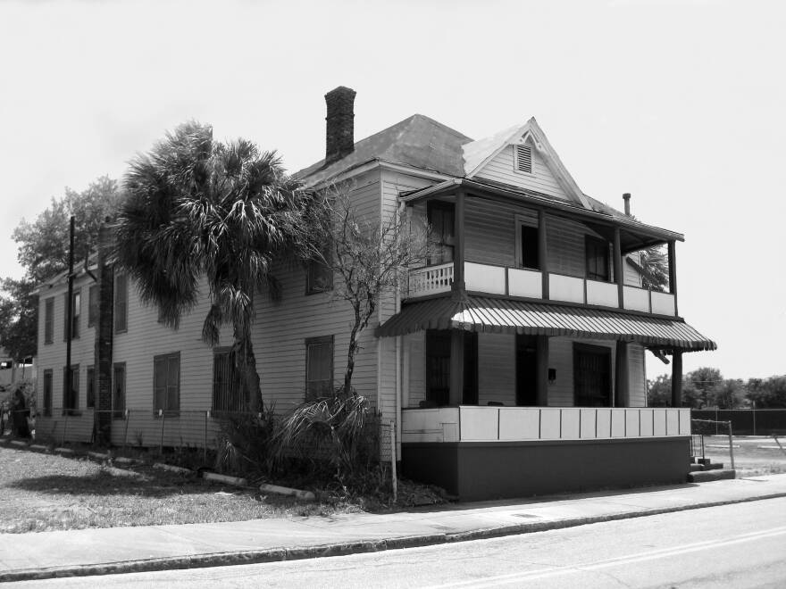 Black and white photo of a house 
