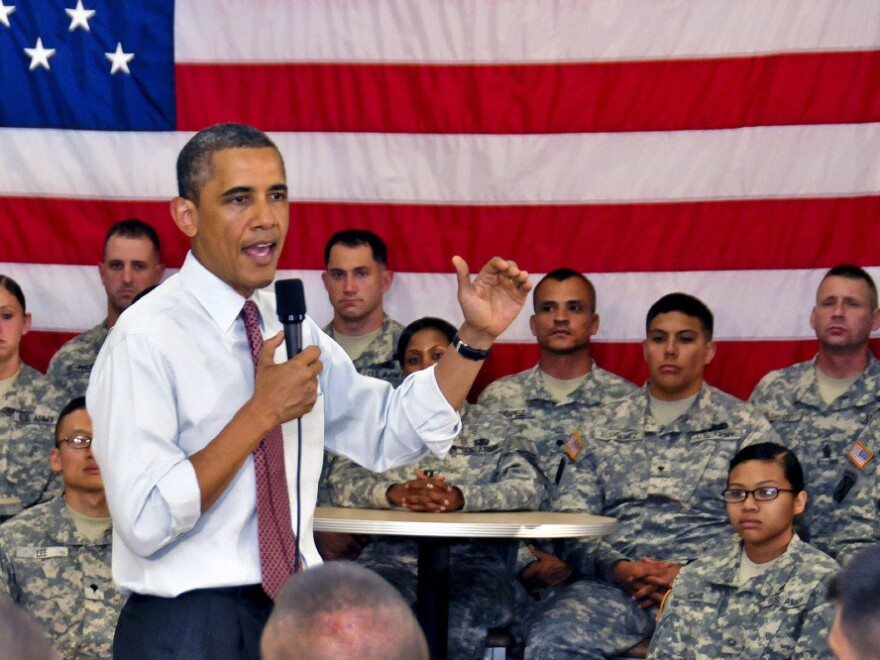 President Barack Obama speaks to about 150 soldiers during his visit to Fort Drum, New York. The president thanked the soldiers one day after announcing a drawdown of troops from Afghanistan during a televised address to the nation. The soldiers, assigned to the 10th Mountain Division's 1st Brigade Combat Team, were among the first to deploy to Afghanistan following the attacks on 9/11.
