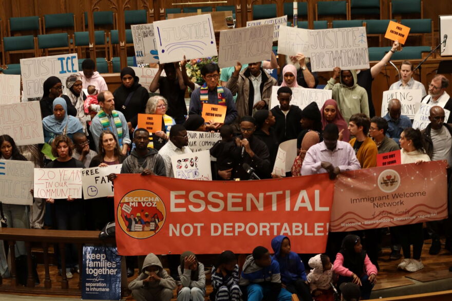 Local officials, clergy, immigration advocates and neighbors call for the release of Fatou Traore at First United Methodist Church in Iowa City on Wednesday.