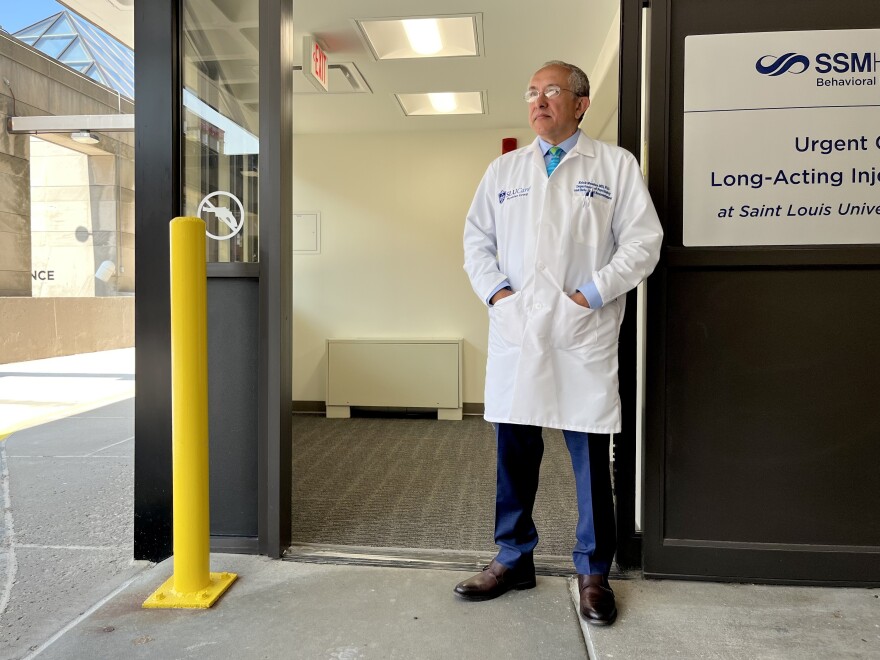 Psychiatrist Erick Messias stands outside the soon-to-be opened behavioral health urgent care clinic near SSM Health St. Louis University Hospital. "W'eve been living as a nation in a mental-health crisis," he said.