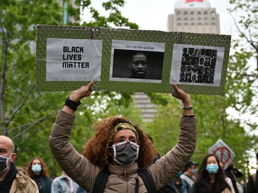 Thousands of demonstrators march in central Montreal against racism and police violence on Sunday.