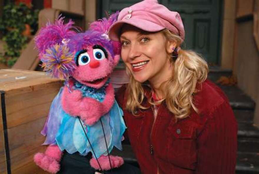 Image: Leslie Carrara-Rudolph with Abby Cadabby, wikipedia.org